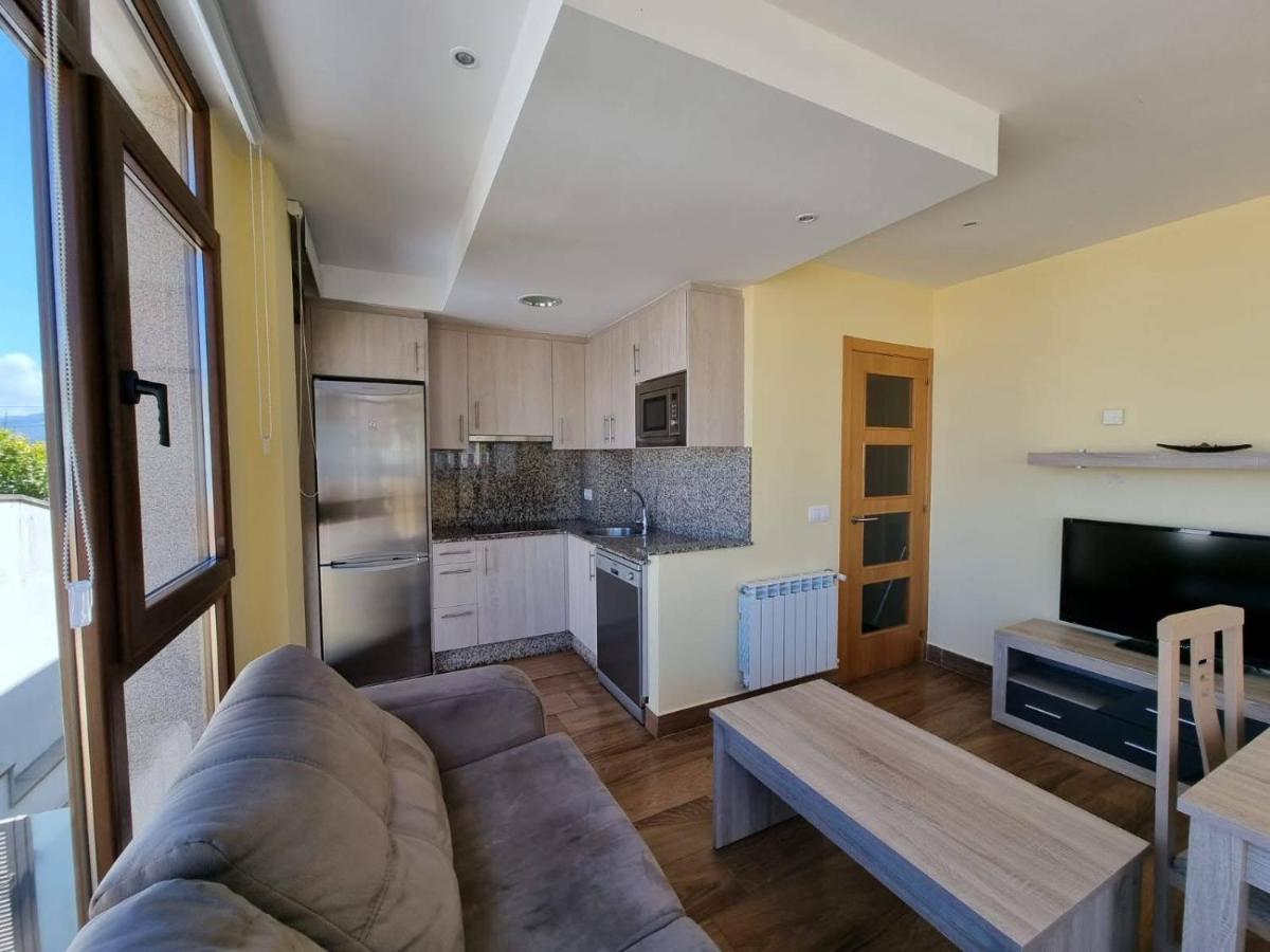 Vivienda de tres dormitorios en primera línea de playa Foz Exterior foto