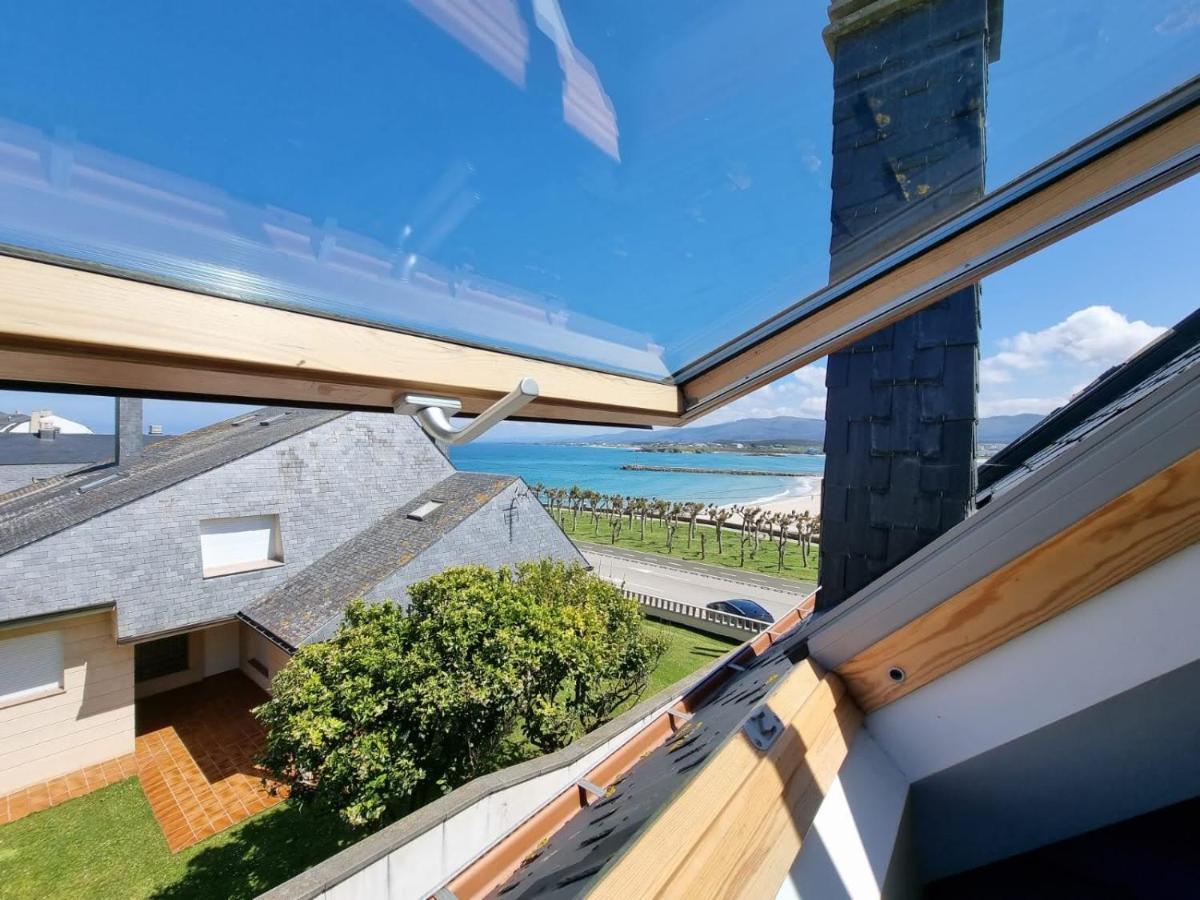 Vivienda de tres dormitorios en primera línea de playa Foz Exterior foto