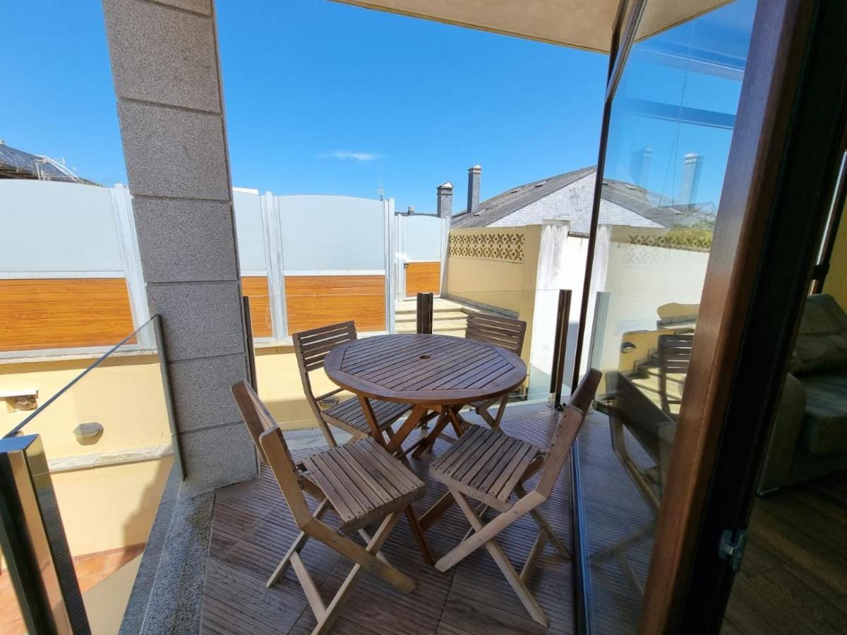 Vivienda de tres dormitorios en primera línea de playa Foz Exterior foto