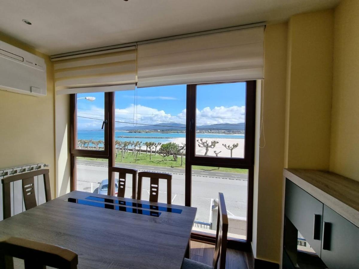 Vivienda de tres dormitorios en primera línea de playa Foz Exterior foto